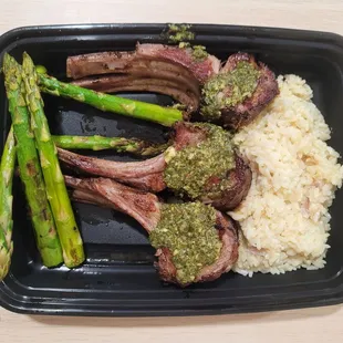 rack of lamb served with risotto &amp; vegetables