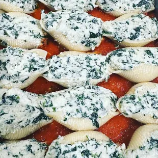 a close up of a dish of stuffed shells