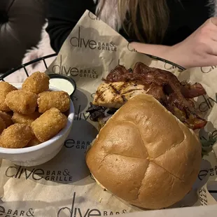 a burger and tater tots