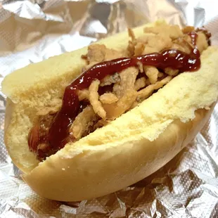 Roadhouse Hot Dog: Martin's Potato Roll, All-Beef Hot Dog, Chili, Crispy Onions, and BBQ Sauce