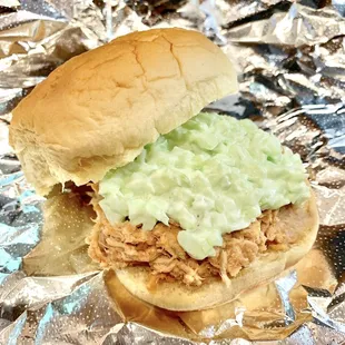 BBQ Sandwich: Martin's Potato Roll, Tangy NC-Style BBQ, topped with sweet and tangy coleslaw