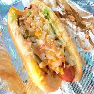 Golden Arches Hot Dog:  Martin's Potato Roll, All-Beef Hot Dog, Pickles, Melted Cheese, Lettuce, Chopped Onions, DD Sauce, and Sesame Seeds