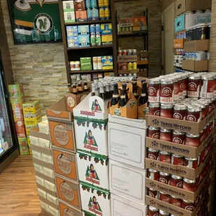 a large stack of boxes and cans