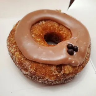 Cronut ($9.99). This the Vegas December 2025 flavor, Pain au Chocolat.