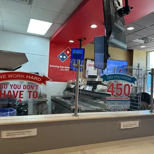 a view of a restaurant counter