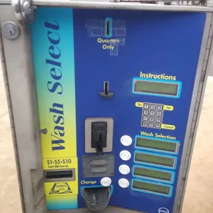 a close up of a coin machine