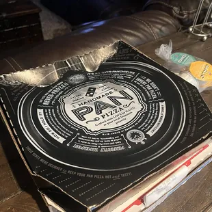 Squished pizza box