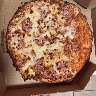 a pizza in a pizza box