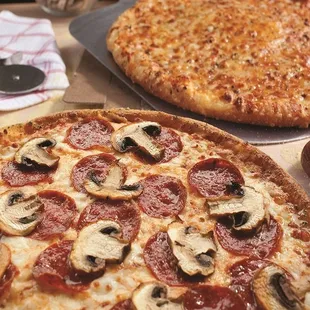 pepperoni, mushrooms, and cheese pizza