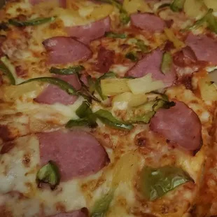 Ham, pineapple, and green peppers on regular hand tossed crust.
