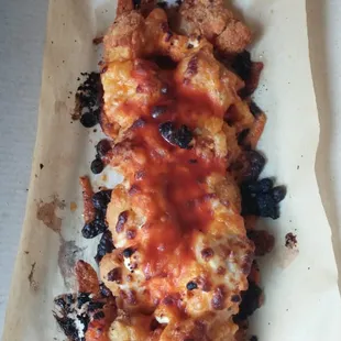 Our horrible tasting and looking order of specialty chicken. This looks nothing like the ad.