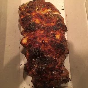 Hard as rock. Burnt from both sides.