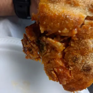 A slice of pizza that who knows what was done to it.