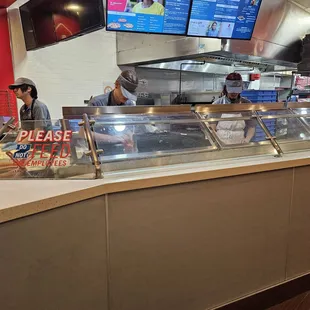 Is there a customer standing there?? Too busy to notice.