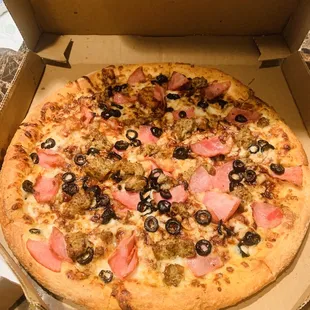 Canadian bacon, olives and Italian sausage large pizza w/ bbq sauce.