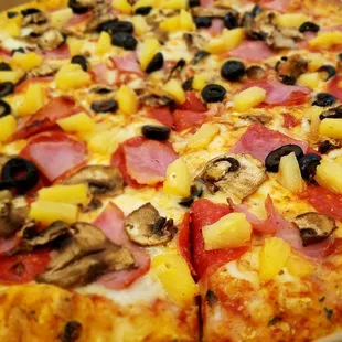 Large 3-topping for $7.99. Pineapple, olive, mushroom, ham, and half pepperoni. Got a 2nd just cheese to put the toppings on this one.