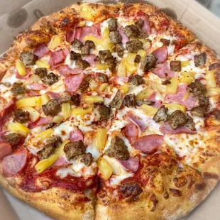 Pineapple, Sausage and Ham on regular hand tossed crust.