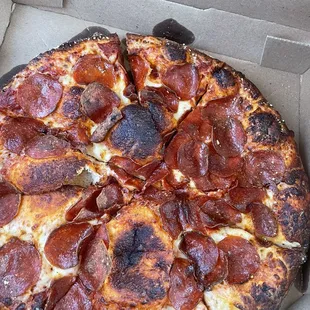 A burnt pizza.