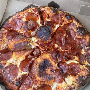 Burnt pizza.