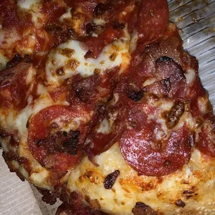The "pan pizza" with "toppings all the way to the crust"