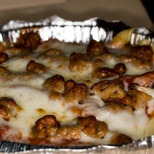 a close up of a pizza