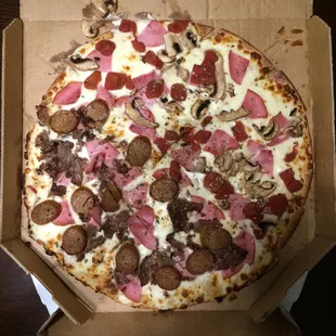 Delicious large thin crust pizza.
