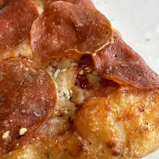 Pepperoni pizza with eggs