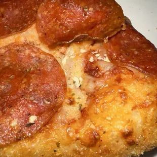 Pepperoni pizza with eggs