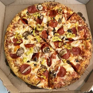 Pepperoni, mushroom, banana peppers, on hand tossed regular crust.