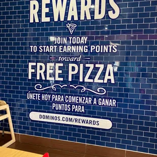 a sign on the wall of a restaurant