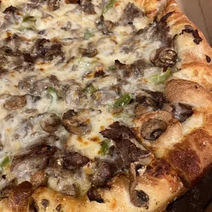 Steak and Provolone on top.... Hit the spot! Highly recommend the Philly Cheesesteak pizza from Dominos.