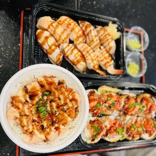 E4. Seared Salmon Poke Bowl, C9. Volcano Roll, B5. Garlic Set
