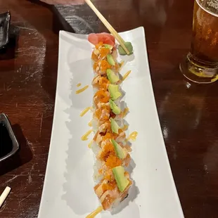 Boss roll! Marvin created it for me! So good! Tuna, cucumber, salmon, avocado and masago! So good!