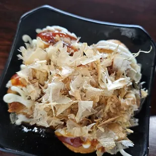 Takoyaki (Wheat batter with octopus' fillings)