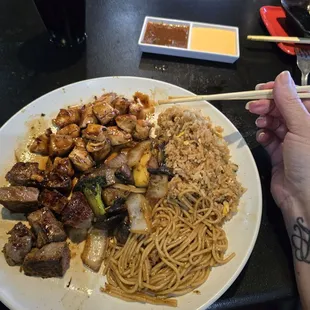 Steak and chicken combo. ( veggies,  rice, noodles)
