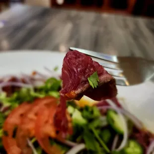 Carpaccio; rare steak.