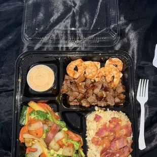 Steak &amp; Shrimp with bacon fried rice.