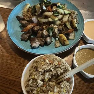 a plate of rice and vegetables