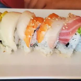 a close up of a plate of sushi