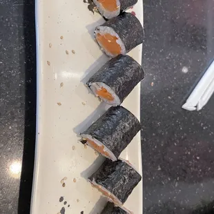 a plate of sushi on a table