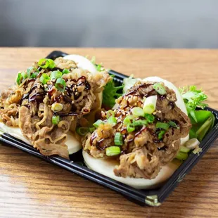 wo buns with meat and vegetables