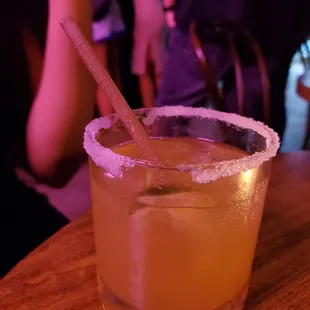 a drink with a straw in it