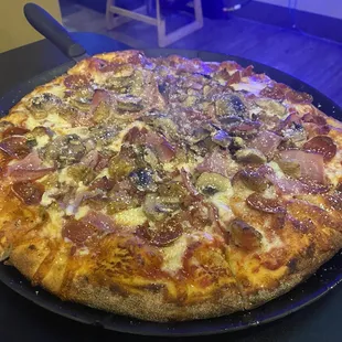 Meat lovers with added mushrooms.