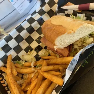 a sandwich and fries