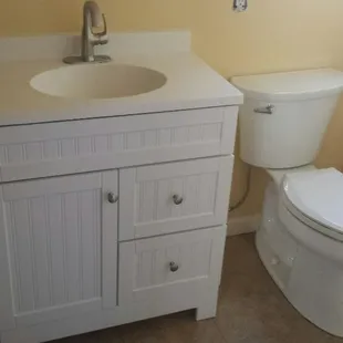 Vanity and toilet installation.