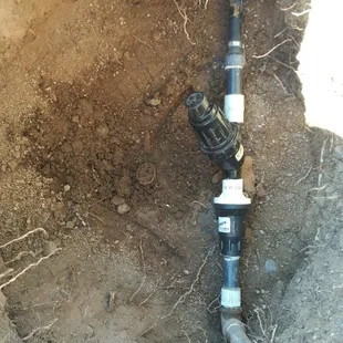 Sprinkler system repair.