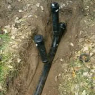 Main sewer line replacement with clean outs.