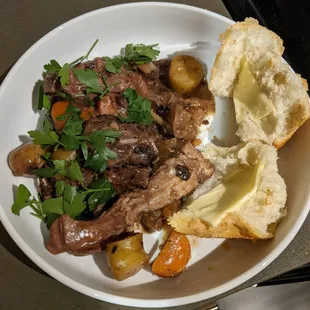 Rabbit stew, with baguette and butter. Rabbit courtesy of Don &amp; Joe&apos;s. All other ingredients, also bought at Pike Place Market!