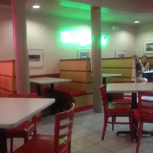 This neon sign is supposed to say "taco salds"