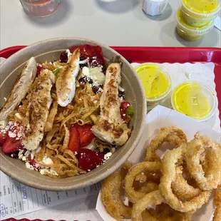 a bowl of food on a tray